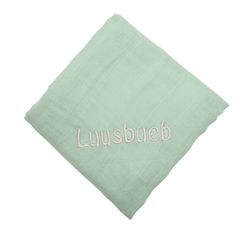 % Nuscheli lindgrün mit Luusbueb