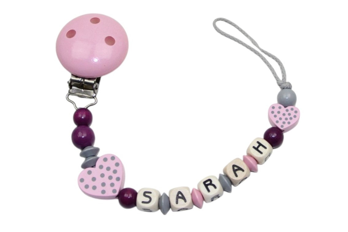 Nuggikette with name polka dot hearts pastel pink:dark purple