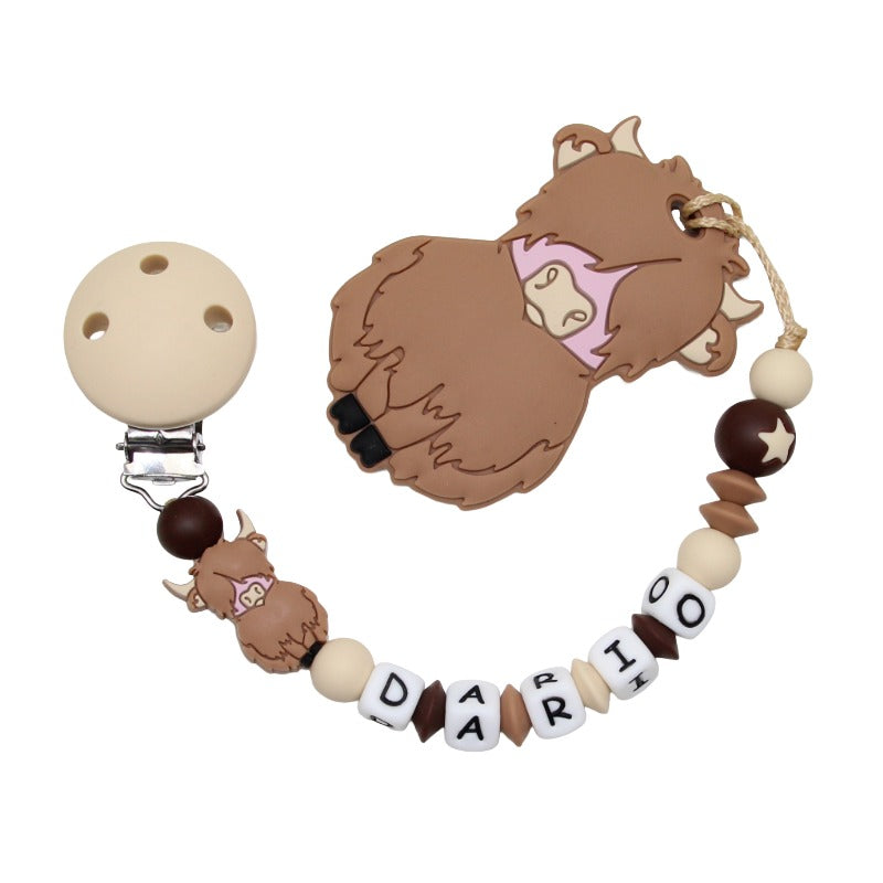 Silicone pacifier chain with name and pendant Highland cow beige:camel